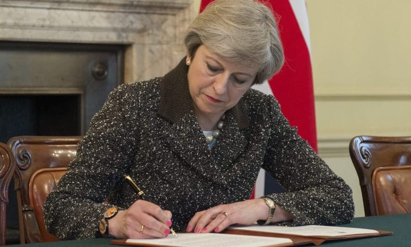 Theresa May signs letter to formally begin Brexit process