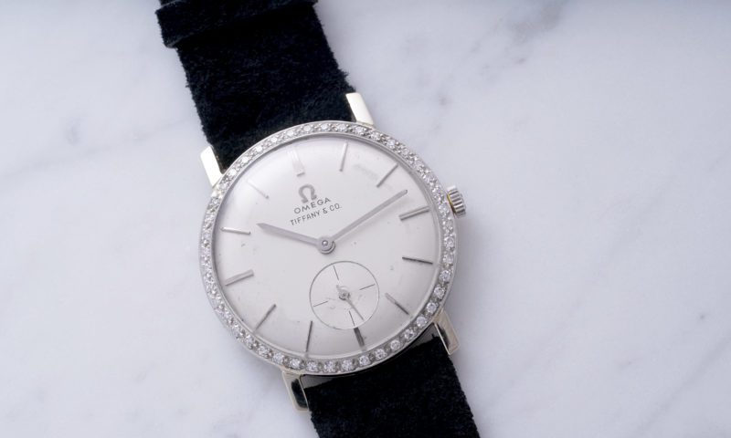 Phillips auctions historic white gold Omega wristwatch